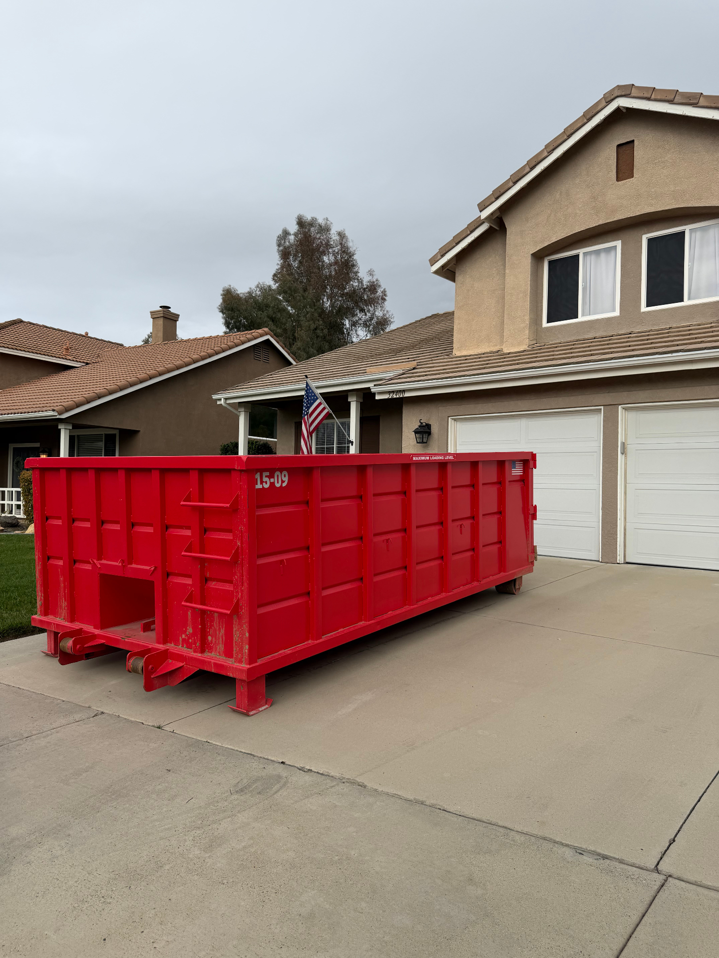 Before photo — cluttered garage or estate property before Victory Dumpster Rentals cleanout service in Temecula Valley, CA